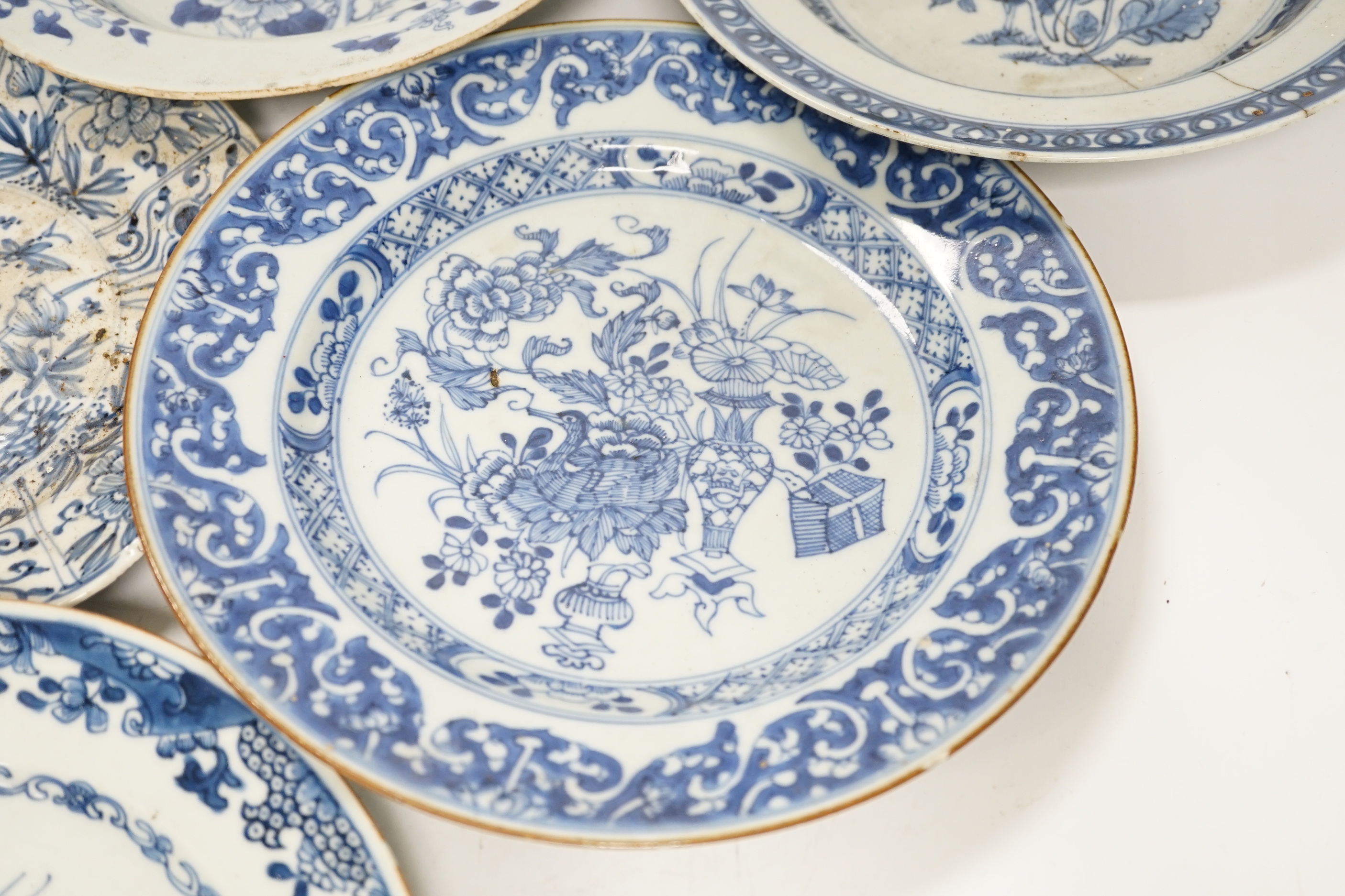 Six 18th century Chinese blue and white dishes and plates, largest 23cm diameter